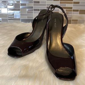 Size 11 open toe sling back. Color Wine